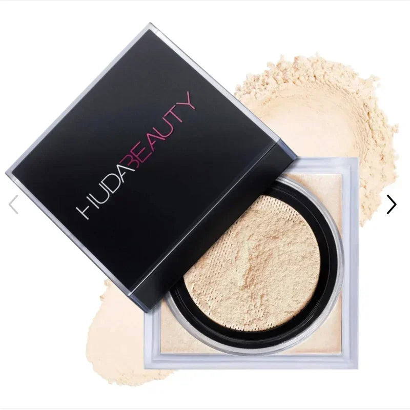 HUDA BEAUTY -Poudre fixatrice délicate longue tenue, contrôle du sébum, maintien de l’hydratation et effet peau lisse sans pores visibles.