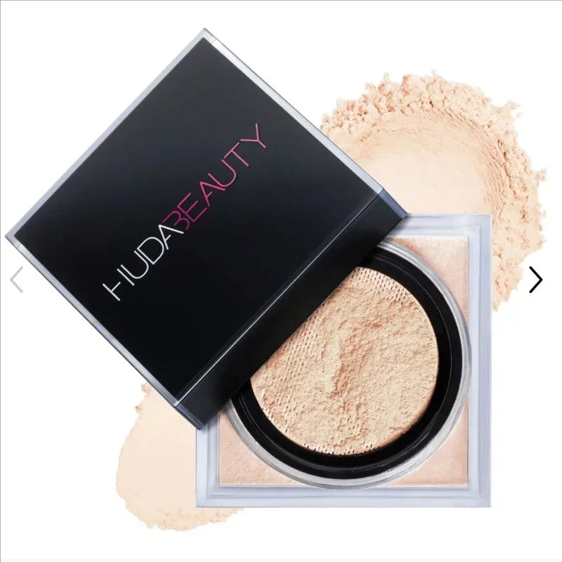 HUDA BEAUTY -Poudre fixatrice délicate longue tenue, contrôle du sébum, maintien de l’hydratation et effet peau lisse sans pores visibles.