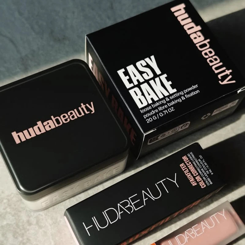 HUDA BEAUTY -Poudre fixatrice délicate longue tenue, contrôle du sébum, maintien de l’hydratation et effet peau lisse sans pores visibles.