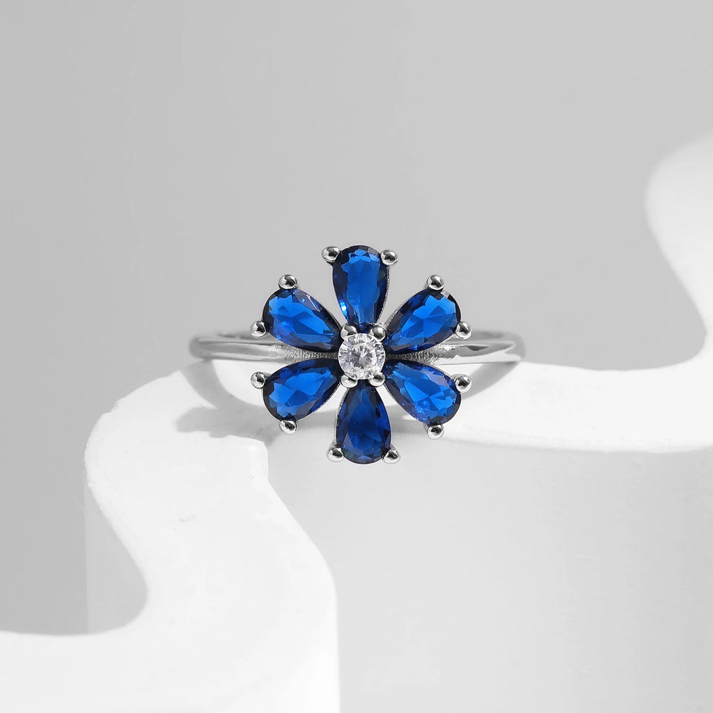 Bague MODIAN en argent 925 - Fleurs raffinées et pierre bleu royal en forme de goutte